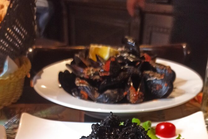 3 Hour Kotor Food Tour - Rick Steves' Recommended - St. Tryphon Cathedral square brings bread, sauces, and mussels
