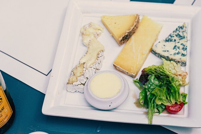 A Morning in Paris Food Tour: Croissants, Baguettes & Chocolate - Quiche, tea, and the first serious pastry round