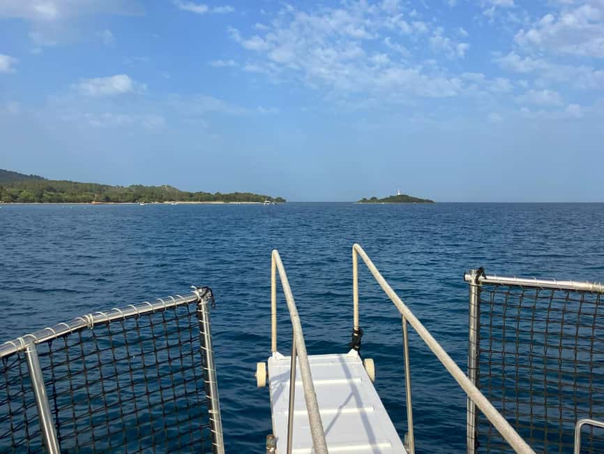 Alcudia Mallorca: Boat Trip with Food, Snorkeling, and SUP - Coastal sailing past cliffs and caves