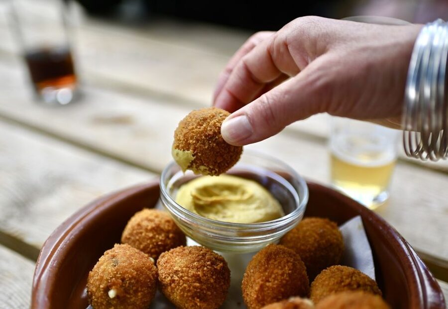 Amsterdam: Jordaan Food Tour of 10+ Local Classic Tastings - Dutch cheese, ham, and sausage set the tone
