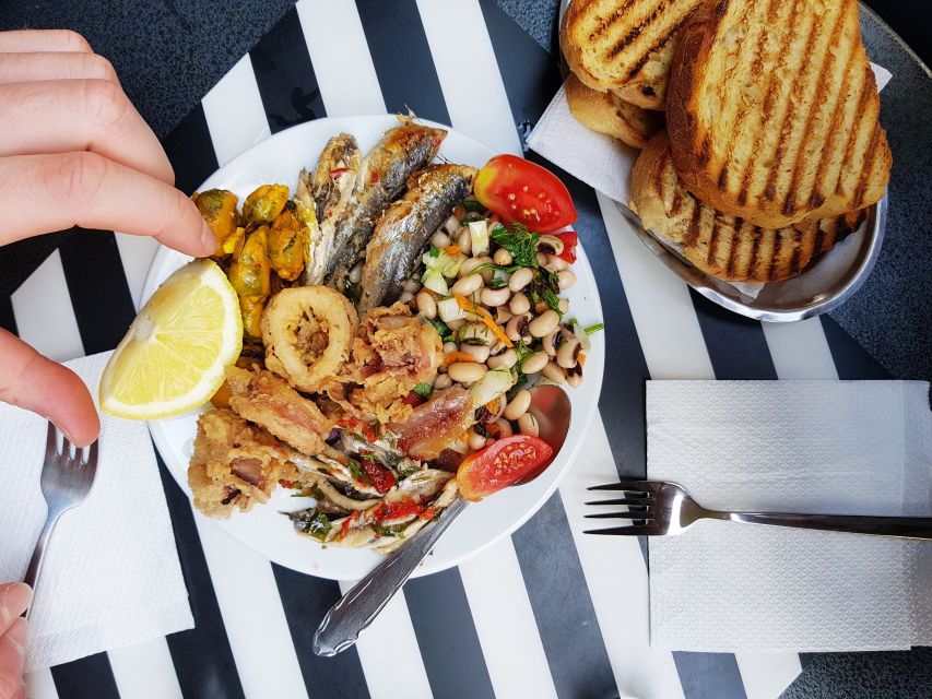 Athens: The Ultimate Food Tasting Tour - Tsipouro and mezze at an unassuming tapas shop