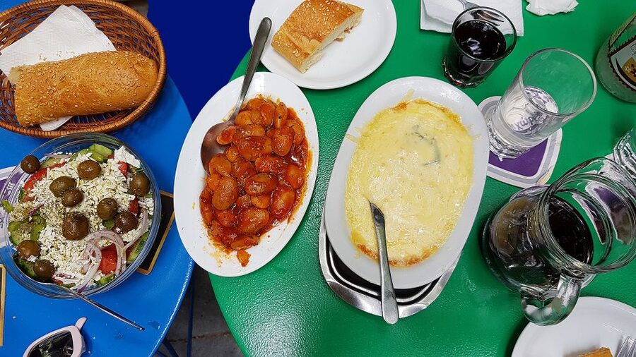Athens: Traditional Greek food tour in hidden spots - Taste olive oil, honey, and market specialties