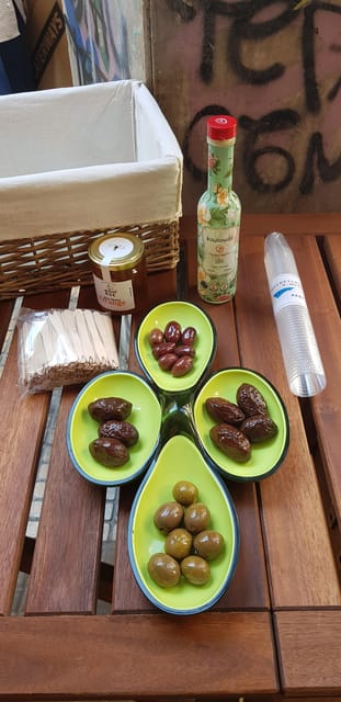 Athens: Traditional Greek food tour in hidden spots - Sit down at family-owned meze tavernas