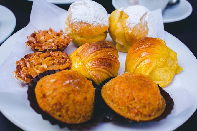 Authentic Food and Wine Tour in Porto by Food Lover Tour - The savory tastings: pork, fish, cheese, and cured meats