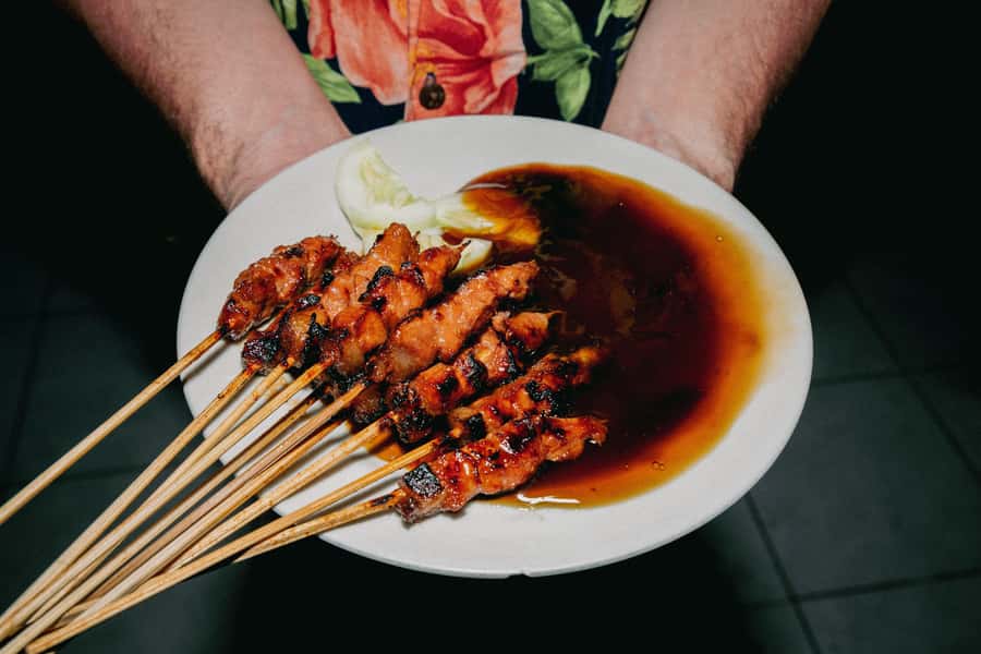 Bali: Bites Food Tour with over 15 Tastings - Wok-fried noodles and a tour of local warungs