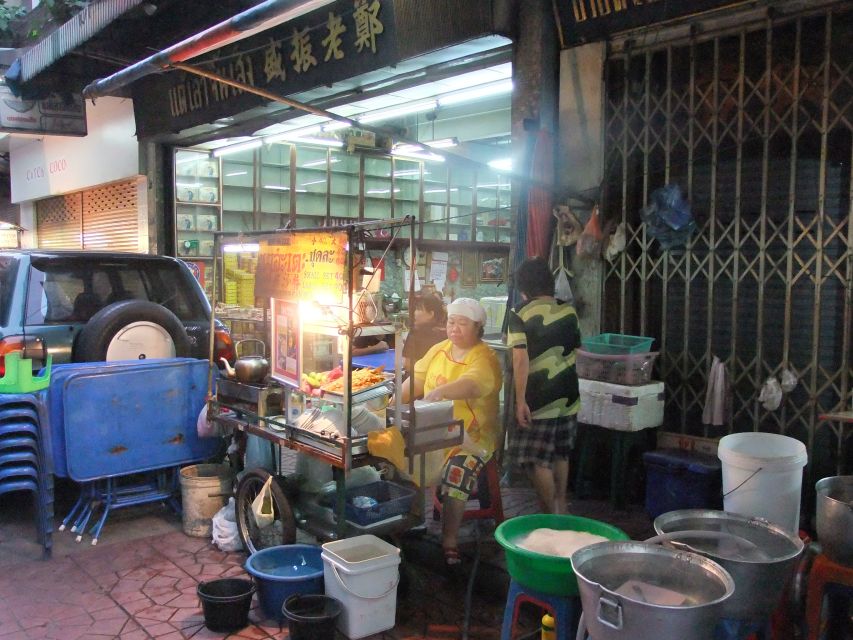 Bangkok by Night Cycling Tour with Street-food Meal - Across the Chao Phraya by pedestrian ferry