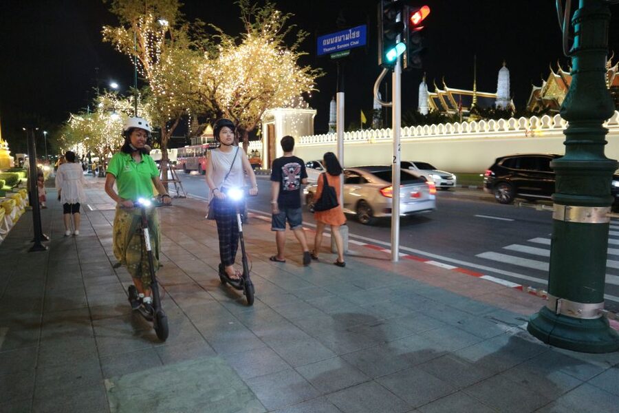 Bangkok: E-Scooter Night Tour with Local Street Food - Wat Pho and the Grand Palace in evening light