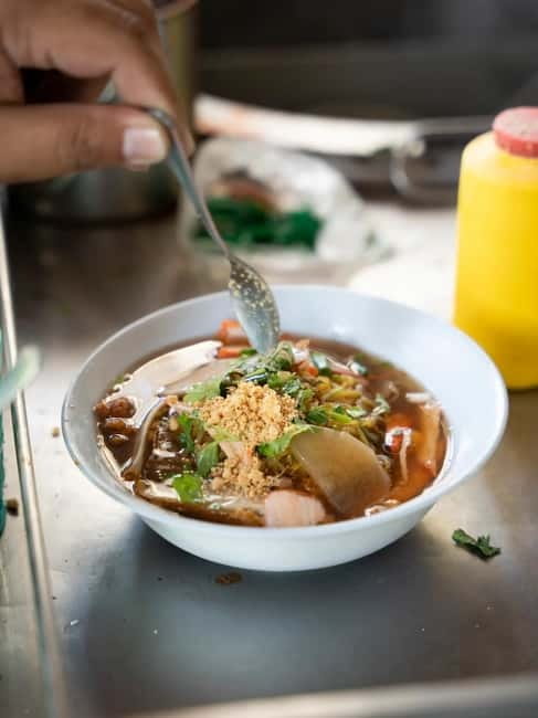 Bangkok: Must-Try Hidden Bike & Food Experience - First food stops: local restaurants, bakery treats, and fruit