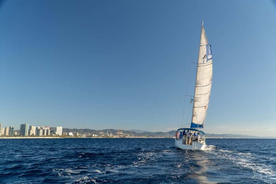 Barcelona: Coastline Sailing with Swim Toys w/ Food & Drinks - Sailing back with the city in view