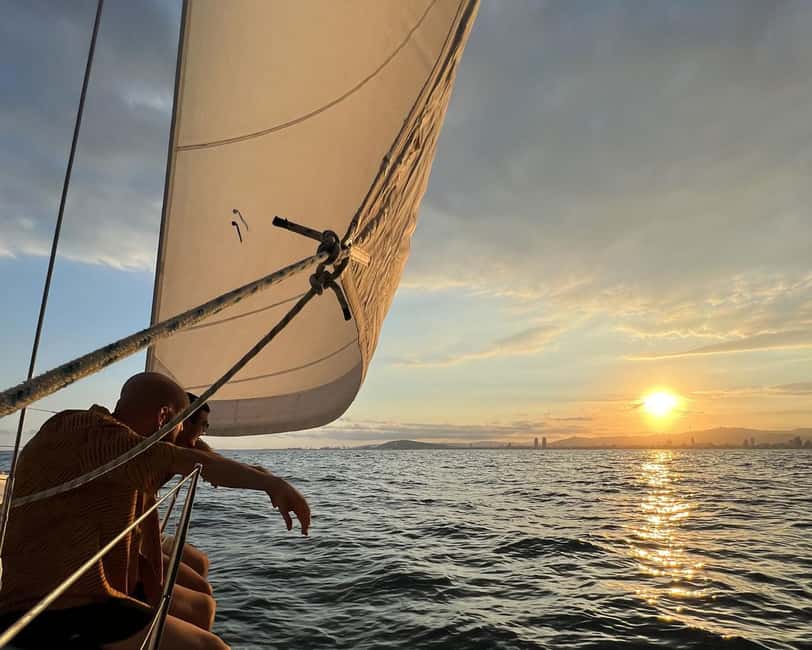 Barcelona: Coastline Sailing with Swim Toys w/ Food & Drinks - The first hour: Barcelona from the water
