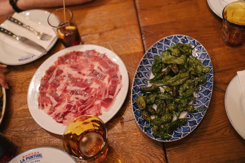 Barcelona: Food Walking Tour with Tapas and Wine - Four eateries with the waiting taken care of