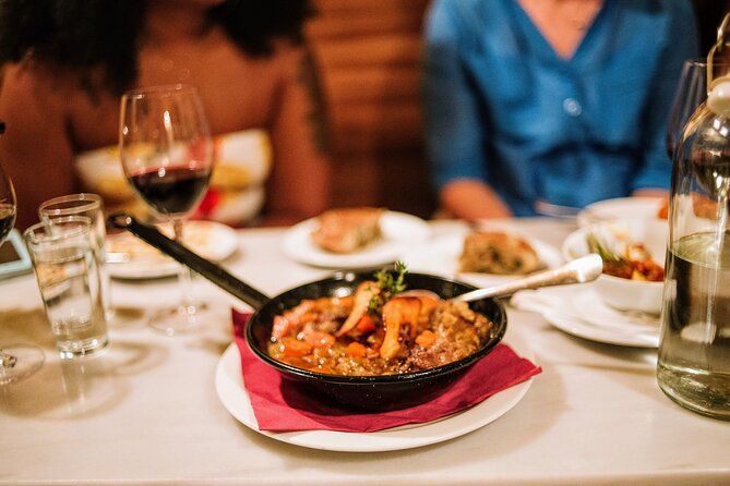 Barcelona Gothic Quarter Tapas & Taverns Food & Wine Tour - Walking past Roman remains and old city stories