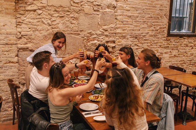 Barcelona: Guided Food Walking Tour with Tapas and Wine - Starting with tapas near Plaça de Correus