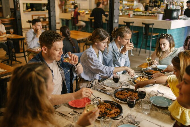 Barcelona: Guided Food Walking Tour with Tapas and Wine - What the $95.53 price really covers