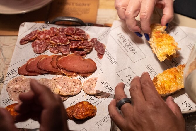 Barcelona Old Town Tapas Tour: Vermouth, Bites & Hidden Gems - Pont del Bisbe and the Old Town’s legends