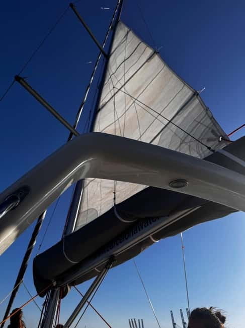 Barcelona: Sailing Tour + Food, Drinks, Swim & Sunset Option - The Mediterranean swim stop