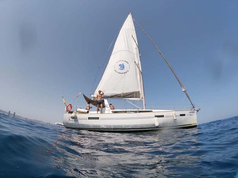 Barcelona: Sailing Tour + Food, Drinks, Swim & Sunset Option - Choosing the daytime or sunset option