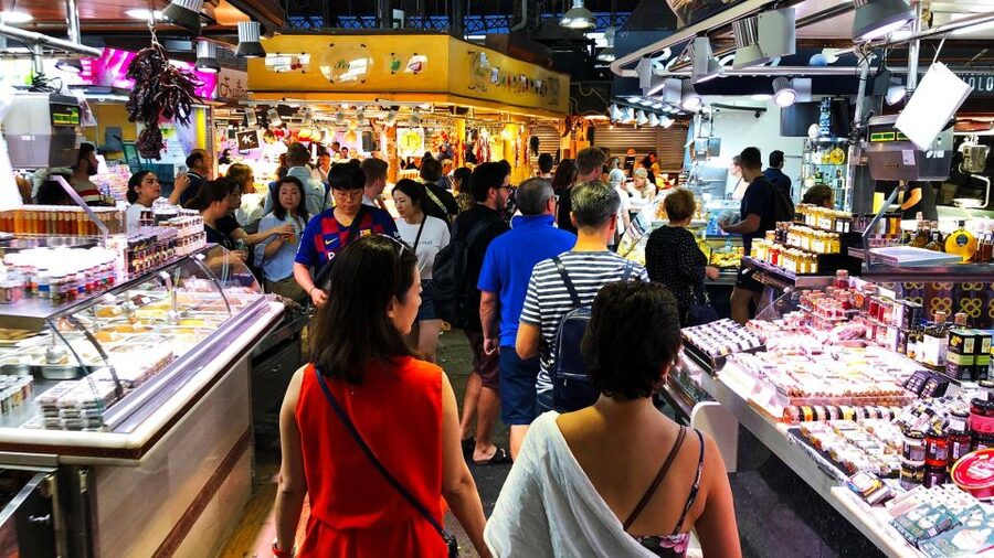 Barcelona: Street Food & Sightseeing Tour with Local Market - From jamón and olives to Catalan favorites