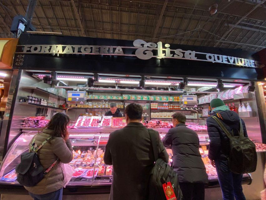 Barcelona: Street Food & Sightseeing Tour with Local Market - Family-run stops and local food advice