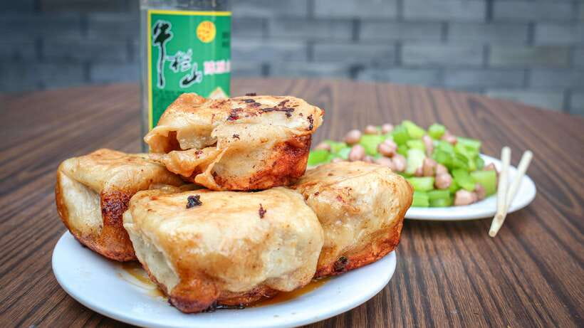 Beijing: Hidden Gems Guided Food Tour with Beer and Tastings - Copper-pot hotpot with a bell tower view