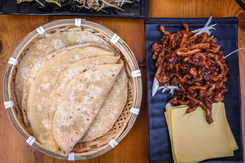 Beijing: Hidden Gems Guided Food Tour with Beer and Tastings - Drinks, portions, and the pace of the meal