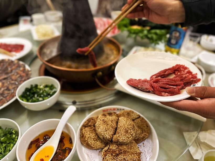 Beijing Hutong Food Crawl Delights: Peking duck, Hotpot&More - Peking duck with a chef at work