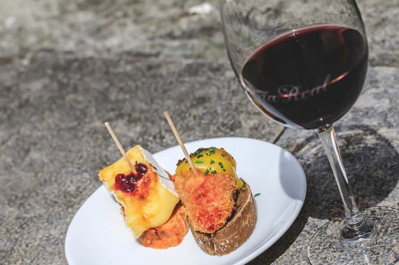 Bilbao: Basque Food Tour and Wine Tasting with Guide - Moving through Bilbao’s old town