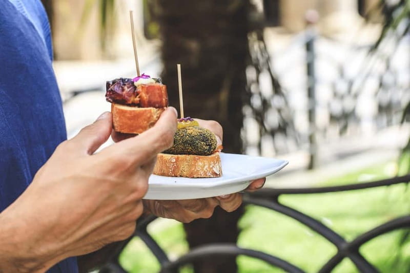 Bilbao: Basque Food Tour and Wine Tasting with Guide - Nine pintxos, with enough food for dinner
