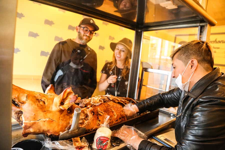 Bogota Food Tour with over 12 Tastings & Tejo - Lechona at a neighborhood eatery