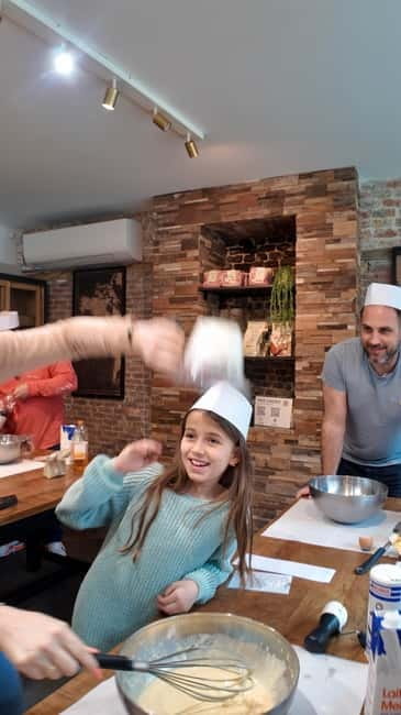 Bruges: 1.5-Hour Waffle Making Workshop - All You Can Eat - Mixing waffles instead of just eating them