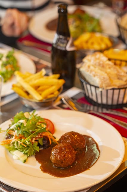 Brussels Food Tour: Main Dish, Beer, Waffle & Chocolate - Place du Grand Sablon and the Belgian food story
