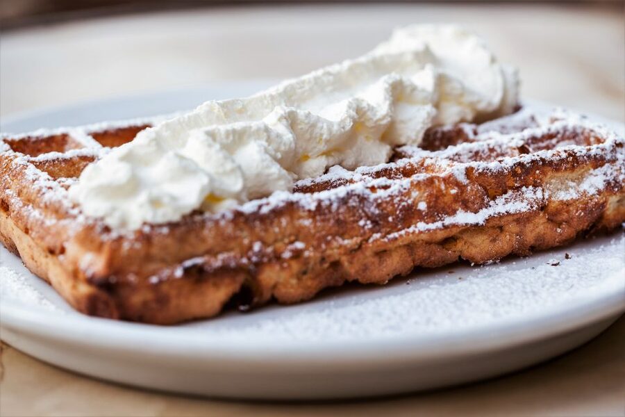 Brussels: Walking Food Tour with Chocolate, Beer, & Waffles - The old town tells a complicated story