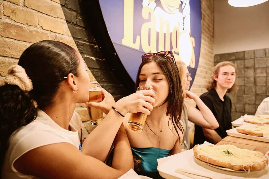 Budapest: Guided Street Food Tour with Sweet Wine - Sit-down dishes: nokedli, stew, and a fuller taste of Hungary