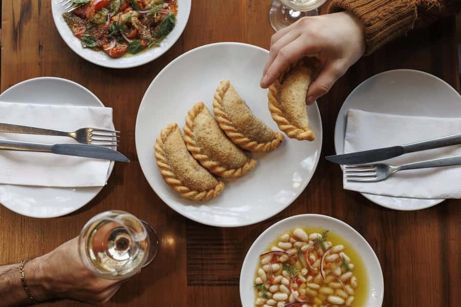 Buenos Aires: Local Foodie Adventure with Sherpa Food Tours - Starting with empanadas at a neighborhood deli
