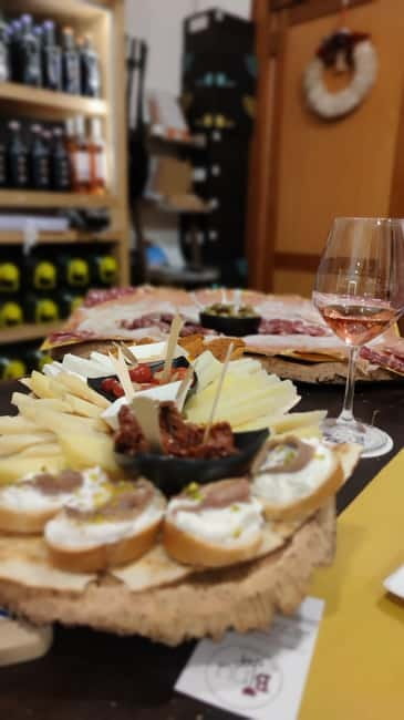 Cagliari: Food and Wine Tasting Experience - How much food do you receive for $57?