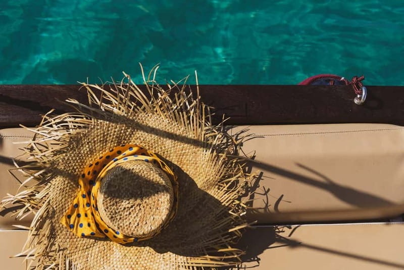 Cagliari: Gozzo Tour with 3 Swim Stops, Snorkel & Local Food - What the $51 price really covers