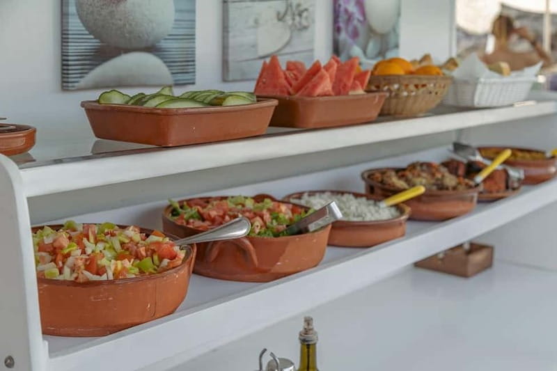 Cala Rajada: Boat Excursion with Drinks and Food - The Captain, Crew, and Onboard Mood