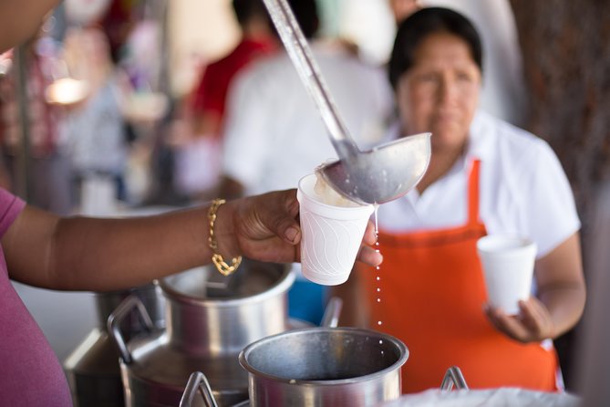 Cancun Street Food Tour with Food Stalls, Local Market and Murals - Guides, drivers, and the ride between stops