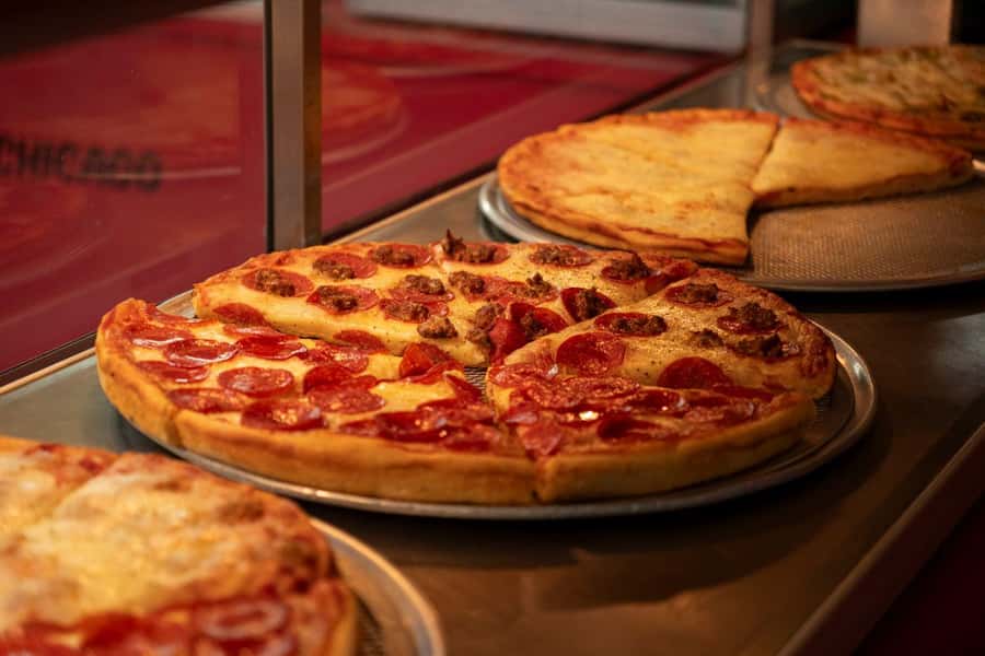 Chicago: The Ultimate Foodie Walking Tour with Tasty Stops - Meeting under the Chicago Theatre marquee