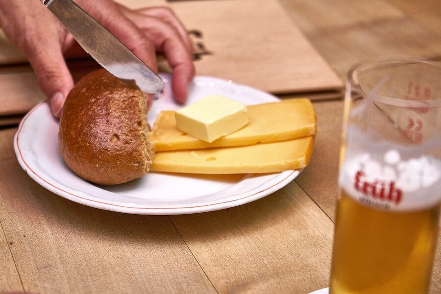 Cologne: Südstadt Guided Foodie Walking Tour - The brewery stop and a traditional Cologne snack