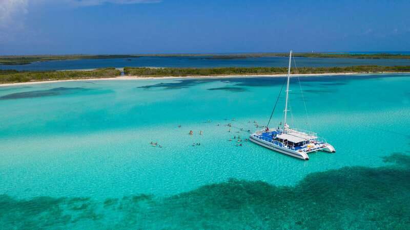 Cozumel: El Cielo, Palancar Reef, and Beach Party with Food - Boarding the 65-foot Fury catamaran
