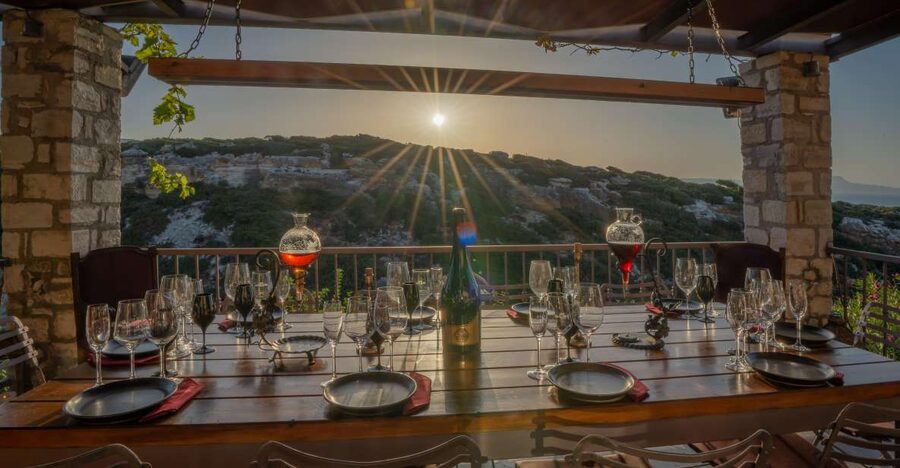 Crete: Unique Wine & Food Experience Inside a Cretan Gorge - A wine table inside Zourida Gorge