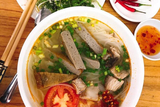 DaNang Night Foodie Tour-Sighseeing with Aodai Lady Rider Private - Five dishes or seven with barbecue and seafood