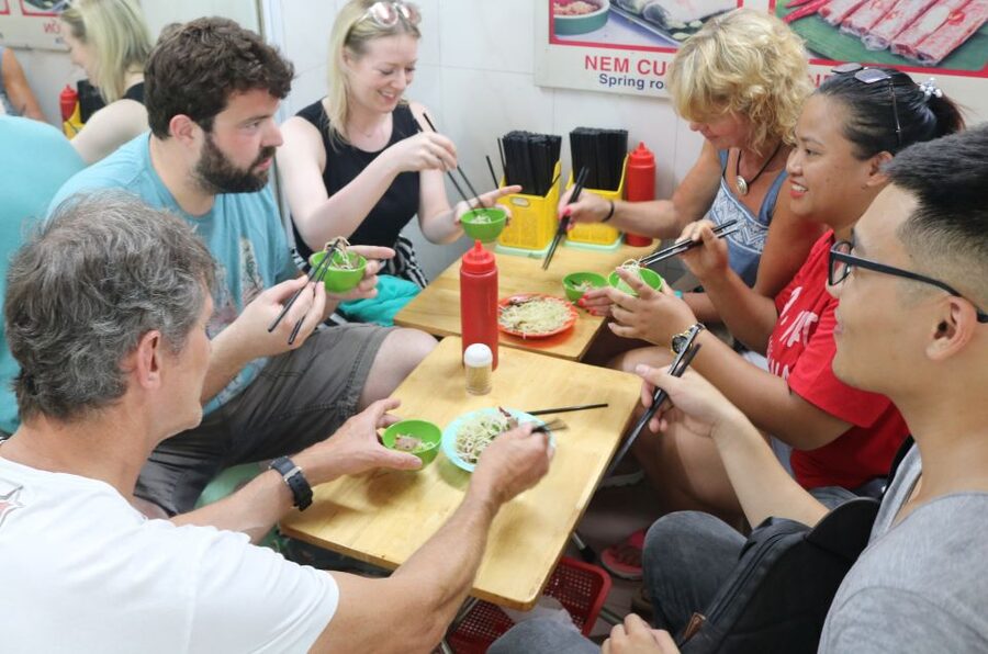 Discover Hanoi's Street Food by Night & Mini Class Coffee - Hanoi streets, markets, temples, and old gates