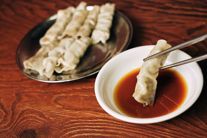 Downtown Seoul Guided Food & Market Tour with 8+ Local Tastings - Gyeongbokgung, Gwanghwamun, and food with a royal backdrop