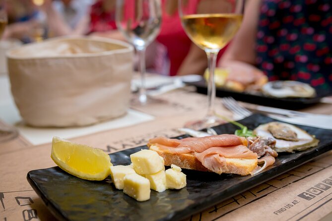 Dubrovnik Food and Drink Walking Tour with a Local Guide - Saint Blaise, Stradun, and the symbols of public life