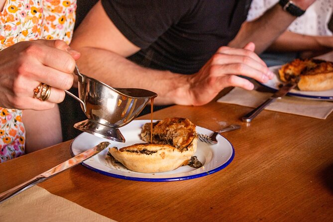 Eating London: Twilight Soho VIP Food & Drinks Tour - Pie and a pint in a favorite Soho pub