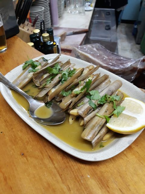 Faro: Old Town Guided Walking Food Tour - Four stops, changing rooms, and a broad menu