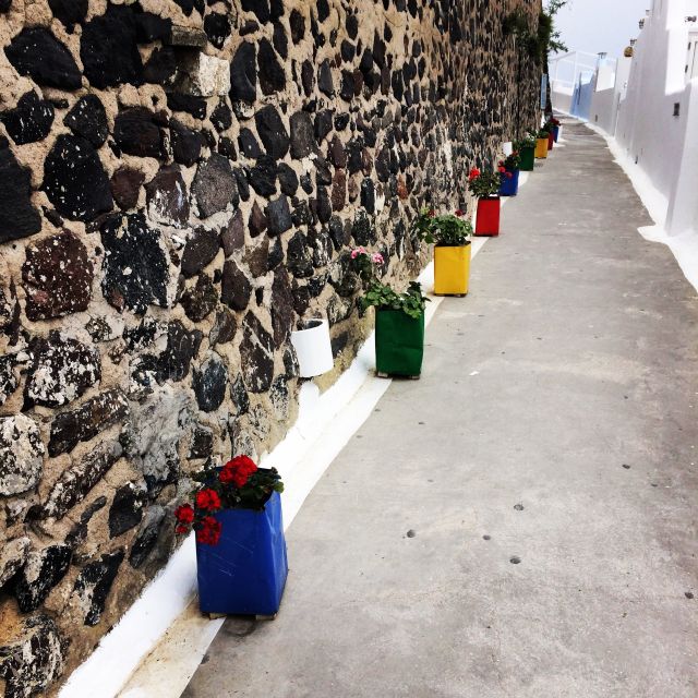 Fira: Guided Foodie Walking Tour with Tastings - The caldera-view tavern meal