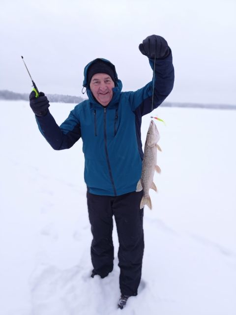 From Helsinki: Bodom Lake Ice Fishing with Food & Drinks - The laavu campfire is the warm reward